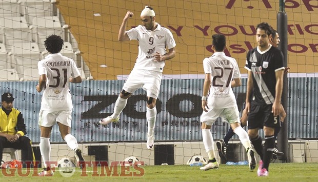 El Jaish striker Abderrazzaq Hamdallah celebrates after scoring against Al Sadd during their Qatar Cup match yesterday. PICTURES: Noushad Thekkayil