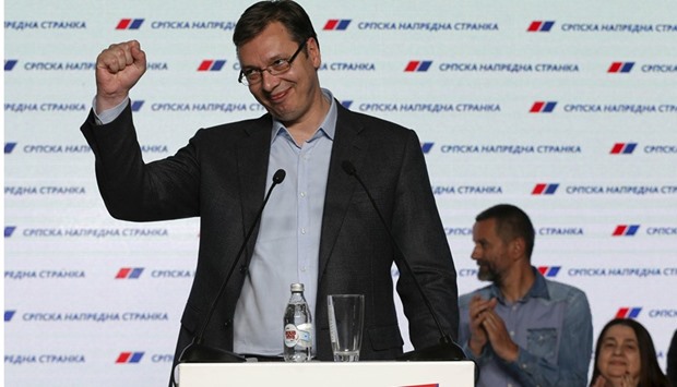 Serbian Prime Minister and leader of the Serbian Progressive Party Aleksandar Vucic reacts after election results were declared yesterday in Belgrade.