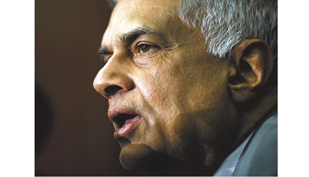Ranil Wickremesinghe speaking during a news conference in Colombo yesterday.