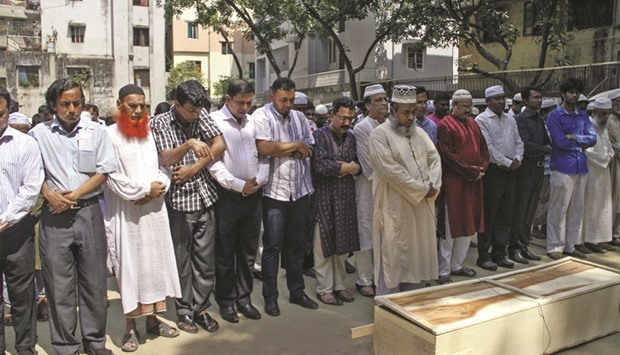 Relatives and friends at the funeral prayer of Bangladeshi activist Xulhaz Mannan in Dhaka yesterday.
