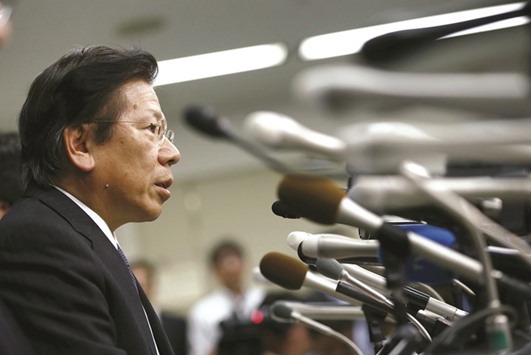 Mitsubishi Motors CEO and president Tetsuro Aikawa speaks during a news conference at the transport ministry in Tokyo. Aikawa, who was on the engineering team that developed the original eK Wagon, said he had no idea the fuel economy readings were being falsified.
