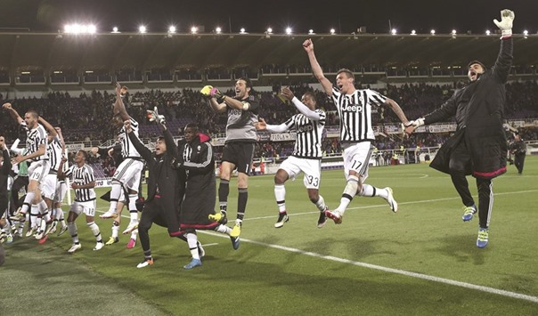 Juventusu2019 players celebrate at the end of the match against Fiorentina.