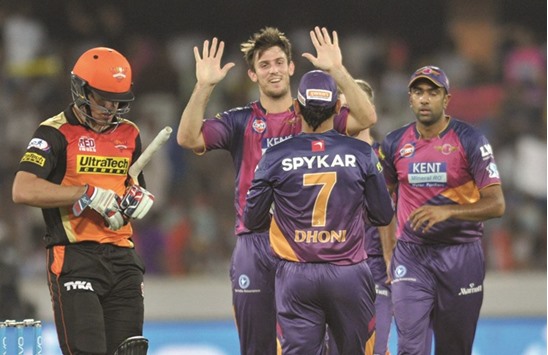 Rising Pune Supergiants bowler Mitchell Marsh (centre) celebrates after dismissing Moises Henriques (left) of Sunrisers Hyderabad during the IPL at the Rajiv Gandhi Stadium in Hyderabad yesterday. (AFP)