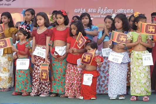 COLOURS OF SRI LANKA: Girls wearing traditional Sri Lankan attire made the event colourful.