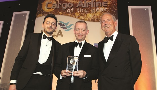 Daniel Parker receives the award from Dan Morgan-Evans, Air Charter Service (left).