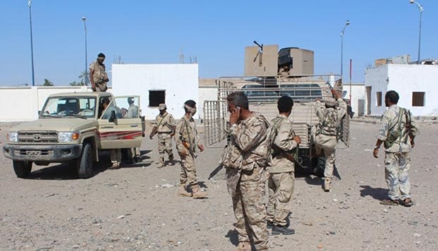 Forces loyal to the Saudi-backed Yemeni president patrol a street in the southern city of Lahj earlier this week during an operation to drive Al-Qaeda fighters out of the southern provinces.