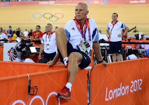 This file photo taken on August 5, 2012 shows Shane Sutton, observing a race in the London 2012 Olympic Games menu2019s omnium 1km time trial cycling event, at the Velodrome in the Olympic Park in east London. (AFP)