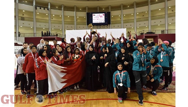 Qatar players celebrate with the winnersu2019 trophy after winning the inaugural GCC Junior Women Handball Tournament 2016 yesterday. Bahrain finished as runners-up, while the United Arab Emirates were the second runners-up. The prestigious week-long event was hosted by the Qatar Women Sport Committee, in collaboration with the Qatar Olympic Committee (QOC) and Qatar Handball Association (QHA) under the supervision of the GCC Women Sport Organizing Committee. PICTURE: Othman al-Iraqi