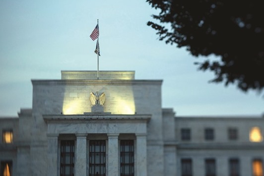 The Federal Reserve building in Washington, DC. The US central banku2019s  policy-setting committee yesterday said the labour market had improved further despite a recent economic slowdown and that it was keeping a close eye on inflation.