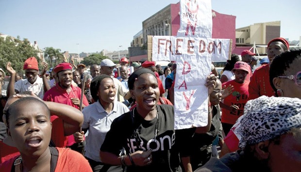 Protesters call for the removal of South Africau2019s President Jacob Zuma at a demonstration in Durban yesterday.