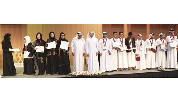 HE the Minister of Education and Higher Education Dr Mohamed Abdul Wahed Ali al-Hammadi and HE Sheikh Faisal bin Qassim al-Thani with the award winners yesterday.