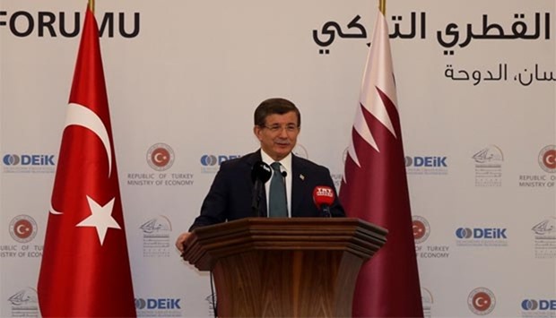 Turkish Prime Minister Ahmet Davutoglu delivers a speech during a business forum organised by the Qatari Businessmen Association. PICTURE: Anas Khalid.