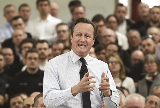 Prime Minister David Cameron speaks to factory workers at a Caterpillar engine factory during an EU debate in Peterborough yesterday. Britain will vote whether to remain or leave the EU on June 23.