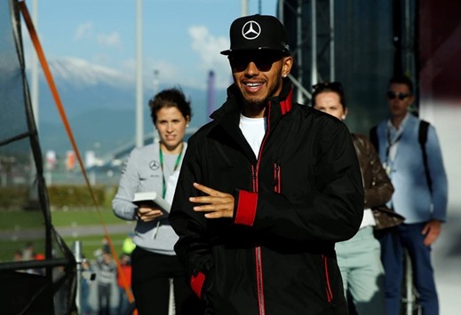 Mercedes Formula One driver Lewis Hamilton of Britain arrives for a  autograph session on the eve of the Russian Grand Prix  in Sochi, Russia yesterday. (Reuters)