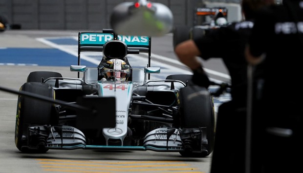 Mercedes' Lewis Hamilton drives into the pitlane during the first practice session for the Russian Grand Prix in Sochi yesterday. (Reuters)