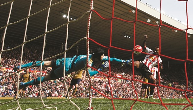 Arsenalu2019s Petr Cech saves a shot from Sunderlandu2019s Jermain Defoe in this file picture.