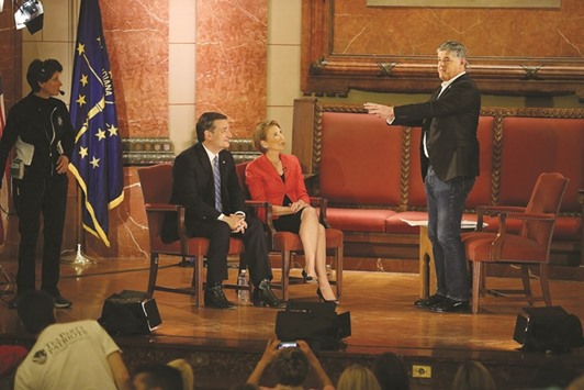 Republican presidential candidate senator Ted Cruz and his vice presidential candidate, former Hewlett-Packard chief executive Carly Fiorina, participate in a taping of Fox News Channelu2019s The Sean Hannity Show at the Indiana War Memorial in Indianapolis, Indiana, yesterday.