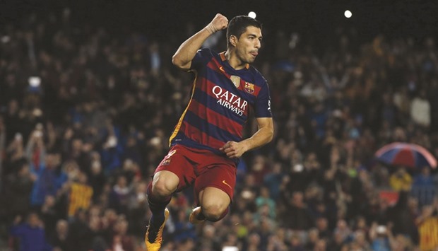 Barcelona's Luis Suarez celebrates a goal against Sporting Gijon earlier this week.