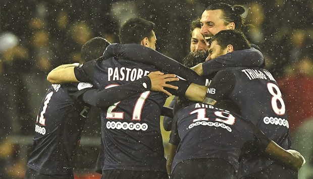 Paris Saint-Germain players celebrate a goal during their 4-0 defeat of Rennes on Friday. (AFP)