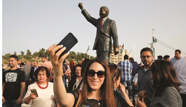 The statue of Nelson Mandela  in the West Bank city of Ramallah. The six-metre  two-tonne bronze statue was a gift from Johannesburg with which Ramallah is twinned.