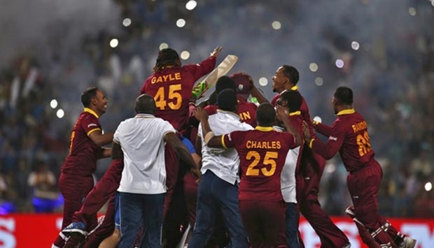 West Indies players celebrate after winning the final