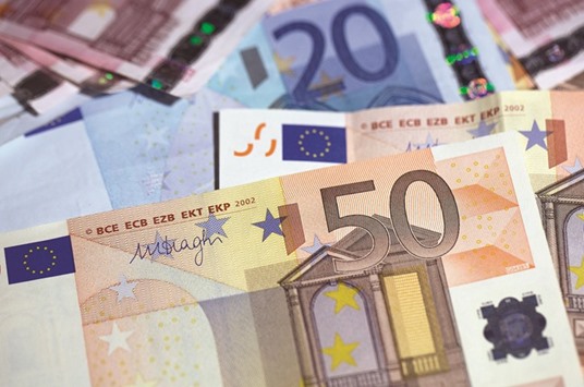 Euro banknotes of various denominations are arranged for a photograph in London. With global financial markets roiled by volatility in the first two months of the year, the ECB seemed to give up targeting a lower level for the euro.