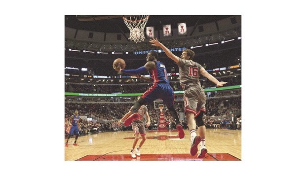 Detroit Pistons guard Reggie Jackson (No 1) shoots past Chicago Bulls center Pau Gasol (R) during their NBA game. PICTURE: USA TODAY Sports