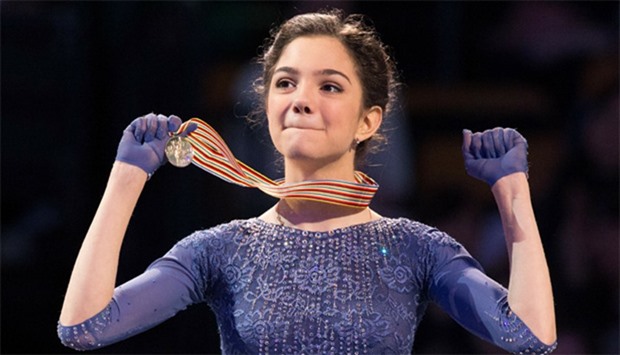 Gold medalist Evgenia Medvedeva of Russia celebrates during the victory ceremony