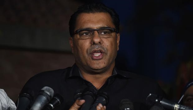 Waqar Younis speaks to reporters in Lahore on Monday.