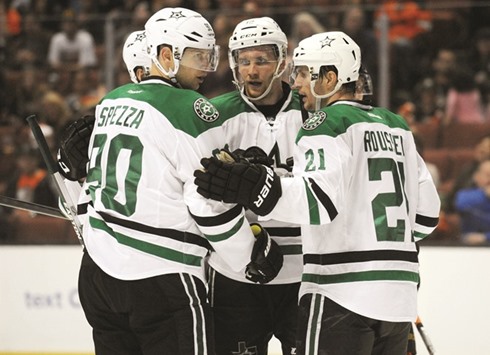 Dallas Stars center Radek Faksa (C) celebrates his goal against Anaheim Ducks with Jason Spezza (L) and Antoine Roussel. PICTURE: USA TODAY Sports