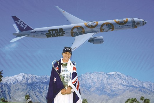 Lydia Ko holds the trophy in Rancho Mirage, California. (AFP)