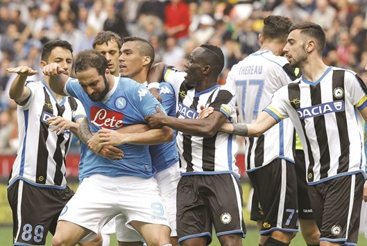 Napoliu2019s Gonzalo Higuain reacts after receiving red card.