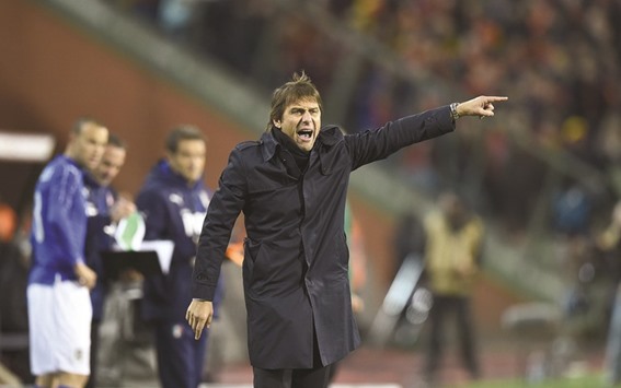 This file photo shows Italyu2019s coach Antonio Conte gesturing during the friendly international match between Belgium and Italy in Brussels.