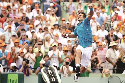 Novak Djokovic of Serbia celebrates his win over Kei Nishikori of Japan during the final of the Miami Open at Crandon Park Tennis Center in Key Biscayne, Florida. (AFP)