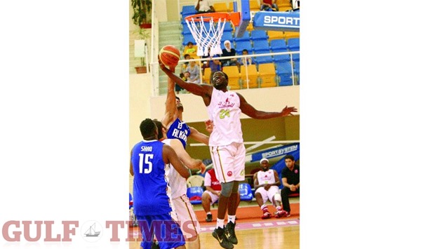 Al Arabiu2019s Oumar Seck (right) scored a whopping 36 points against Al Khor in the Emir Cup basketball tournament at the Al Gharafa Club yesterday. PICTURE: Nasar T K