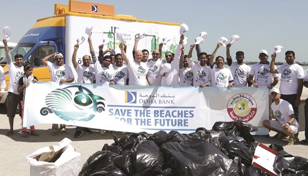 The Doha Bank team at the beach clean-up.