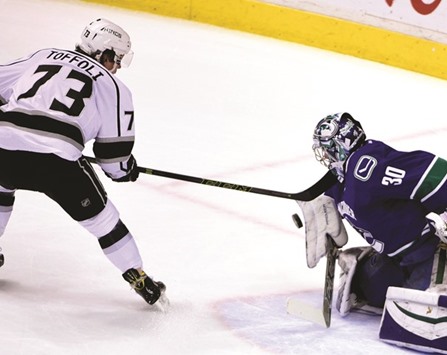 Vancouver Canucks goaltender Ryan Miller (R stops a shot on net by Los Angeles Kings forward Tyler Toffoli during the first period at Rogers Arena. PICTURE: USA TODAY Sports