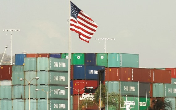 China Shipping containers sit on the dock in Los Angeles, California. The US Commerce Department said yesterday the trade deficit increased 2.6% to $47.1bn, the latest indication that economic growth remained weak in the first quarter.
