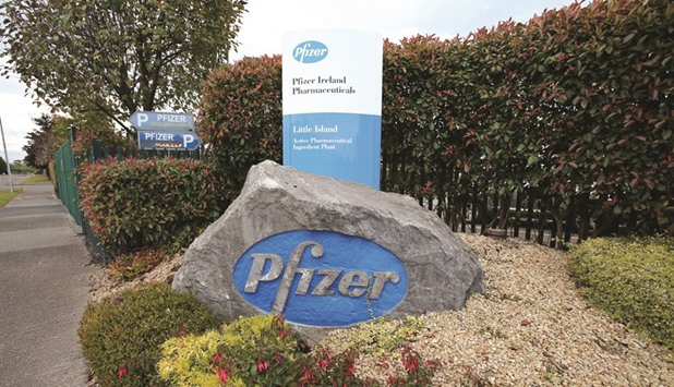 File photo taken on October 2, 2014 shows a view of branding outside Pfizer Pharmaceuticals factory on the outskirts of Cork, southern Ireland. Pfizer shares yesterday climbed 2.8% after gaining 2.1% on Tuesday.