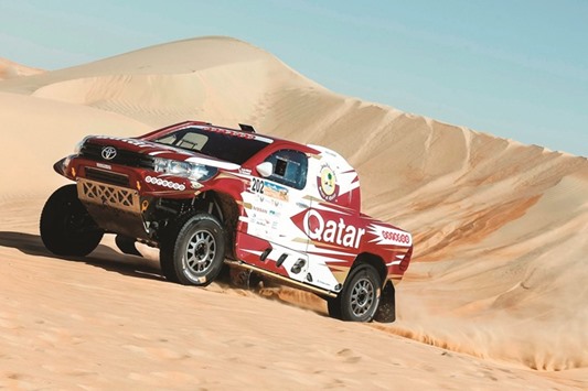 Nasser Saleh al-Attiyah in action in the Abu Dhabi desert Challenge yesterday.