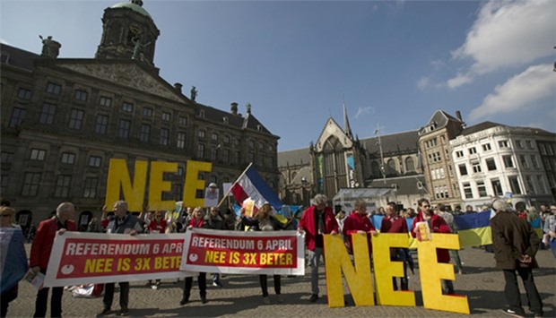 Demonstrators call for people to vote no in the EU referendum during a protest at Dam Square