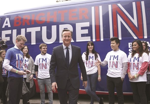 Britainu2019s Prime Minister David Cameron joins students at the launch of the u2018Brighter Future Inu2019 campaign bus at Exeter University in Exeter, Britain yesterday.