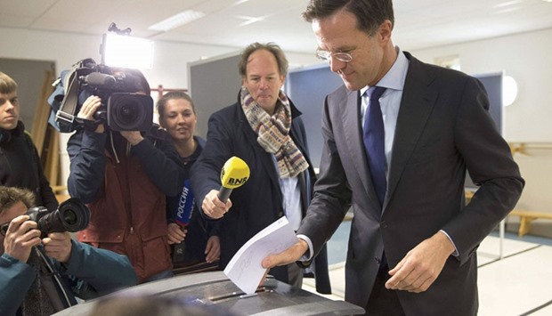 Dutch Prime Minister Mark Rutte casts his vote for the consultative referendum on the association between Ukraine and the European Union, in the Hague, the Netherlands, on Wednesday.