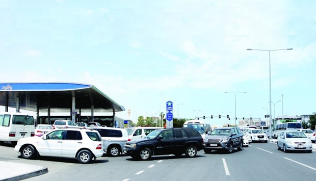 The rush at the Woqod Service Station often clogs at least two lanes of the busy road between the Gulf Cinema and The Mall intersections. PICTURE: Nasar T K.