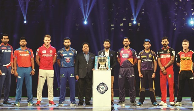 Captains of the IPL teams pose with the trophy during the opening ceremony in Mumbai yesterday.