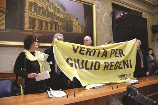 The parents of Italian student Giulio Regeni, Paola Regeni  and Claudio Regeni, holding a banner reading u201cTruth for Giulio Regeniu201d during a press conference with Senator Luigi Manconi, centre, president of the Human Rights commission at the Italian Senate, in Rome on March 29.