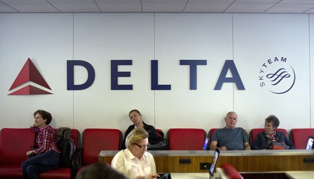 Travellers wait for flights in the Delta Terminal D at LaGuardia Airport in New York. Delta Air is nearing a decision on upgrading its single-aisle fleet as four plane makers bid furiously to win the order, according to reports.