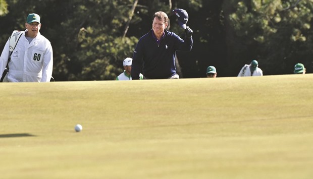 US golfer Tom Watson waves as he walks up on the 18th green during Round 2 of the 80th Masters Golf Tournament at the Augusta National Golf Club on Friday. The 66-year-old, eight-time major champion Tom Watson, said this will be his last Masters.