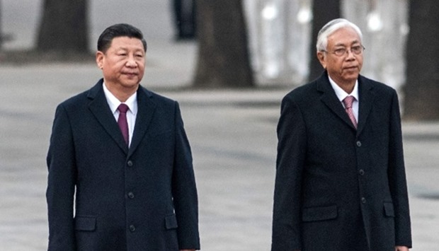 China's President Xi Jinping (L) and Myanmar's President Htin Kyaw