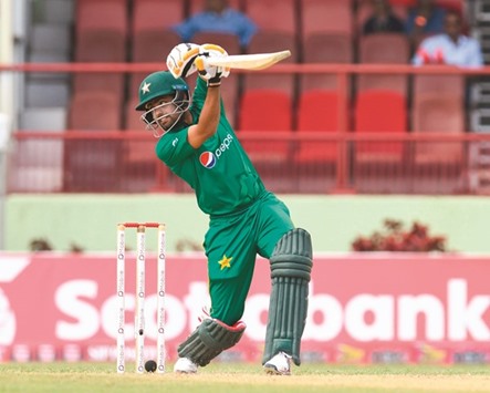 Pakistanu2019s Babar Azam hits a boundary during the second ODI against West Indies in Providence, Guyana, on Sunday. (AFP)